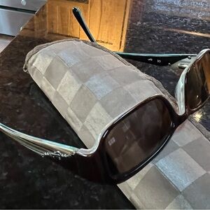 Candies brand prescription sunglasses.  Brown with turq accents.